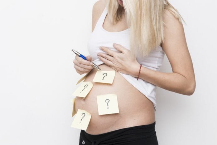 pregnant-woman-with-sticky-notes-1920w.jpg